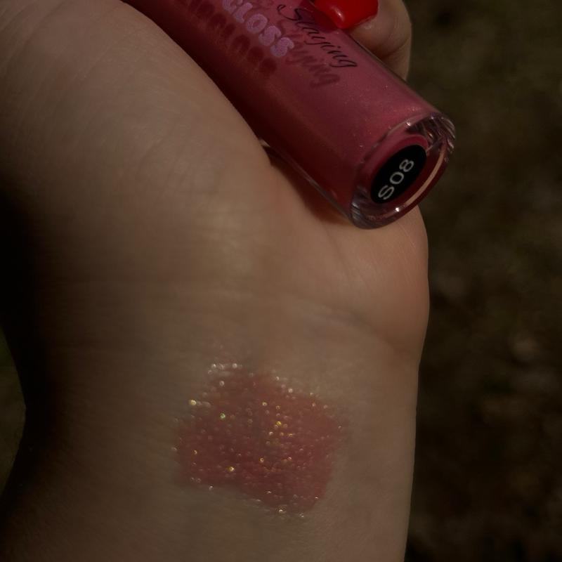 “Her Signature, Lip Gloss”